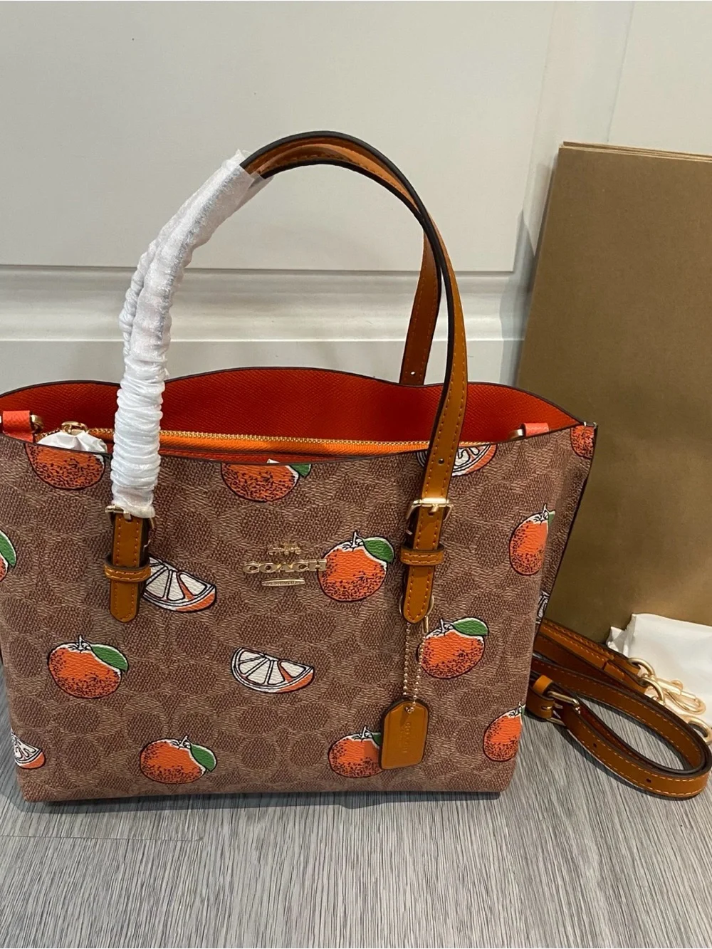 Coach Brown Monogram Tote with Orange Fruit Print